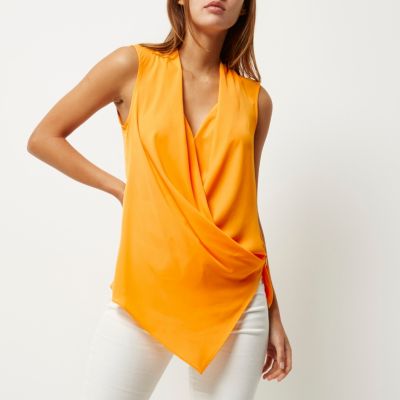 Orange wrap front sleeveless blouse